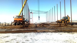 Аренда экскаватора погрузчика с ямобуром в Большой Камень цена от 1562 руб