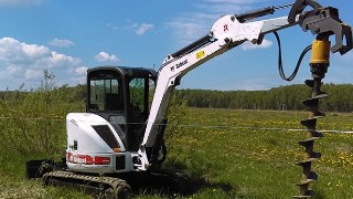 Аренда экскаватора погрузчика с ямобуром в Большой Камень цена от 1562 руб